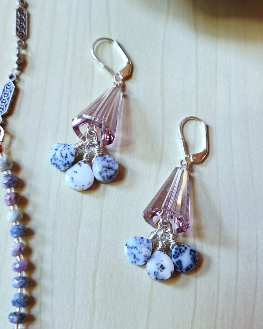 Swarovski crystal cone earrings with sterling silver lever-back wires and dendritic opal teardrop clusters.